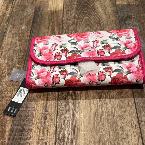 Tahari Handbags - Tahari rosebuds traveling cosmetics hanging case with travel bottle NWT